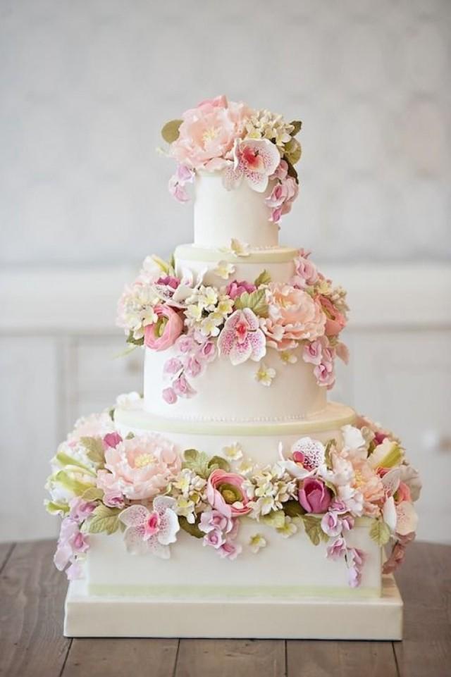 Wedding Cake With Light Colored Blossoms All Around. 2050688 Weddbook