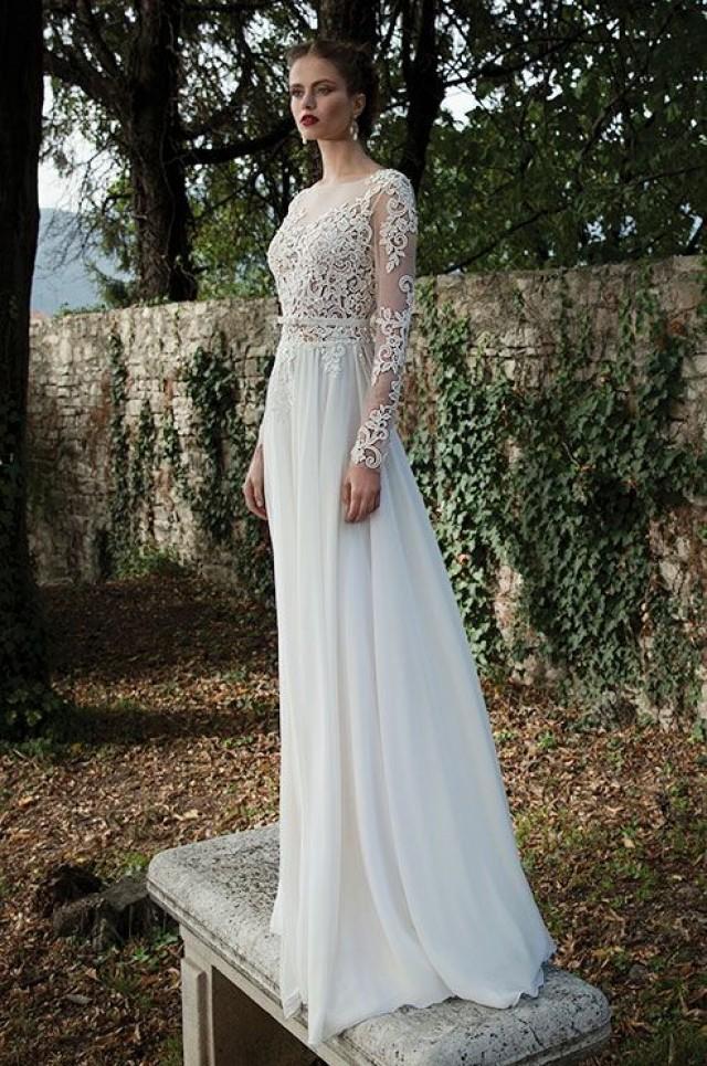 A wedding dress with embellished sleeves