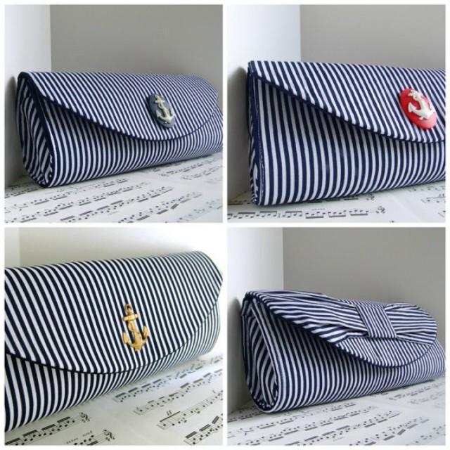 navy blue and white clutch bag