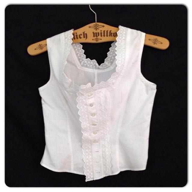 white cotton sleeveless top