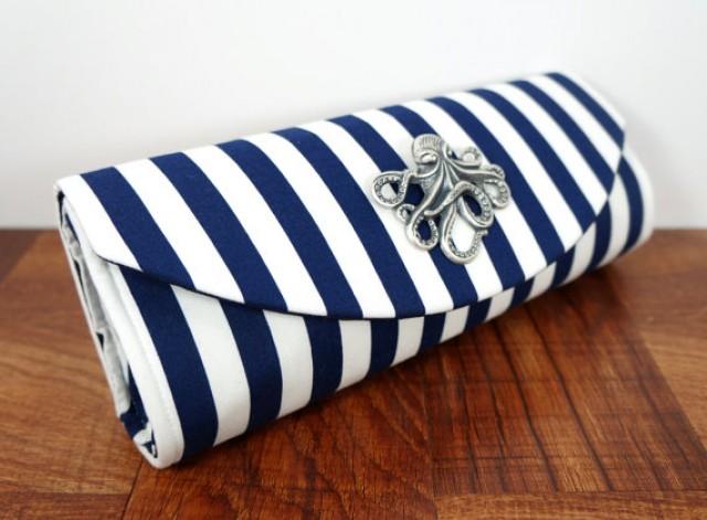 navy and silver clutch bag