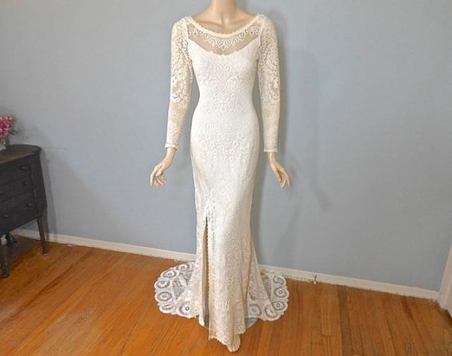 cream lace long sleeve wedding dress