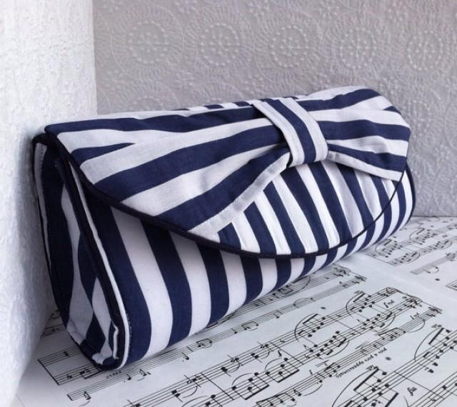 navy & white clutch bag