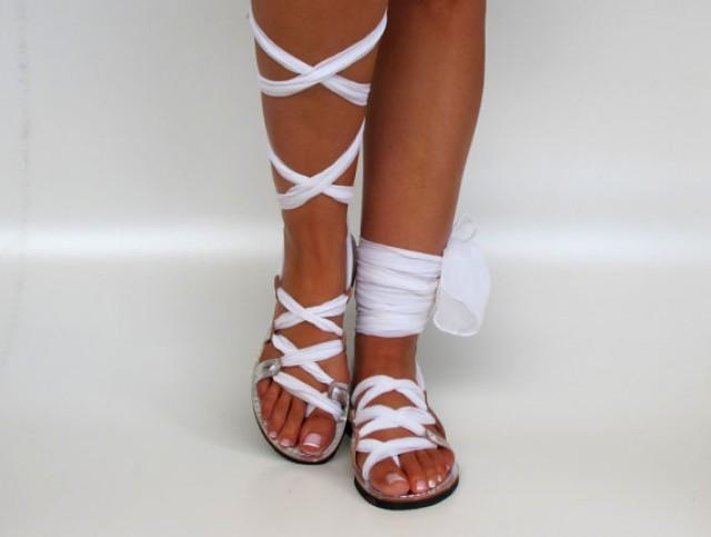 flat sandals with straps up the leg