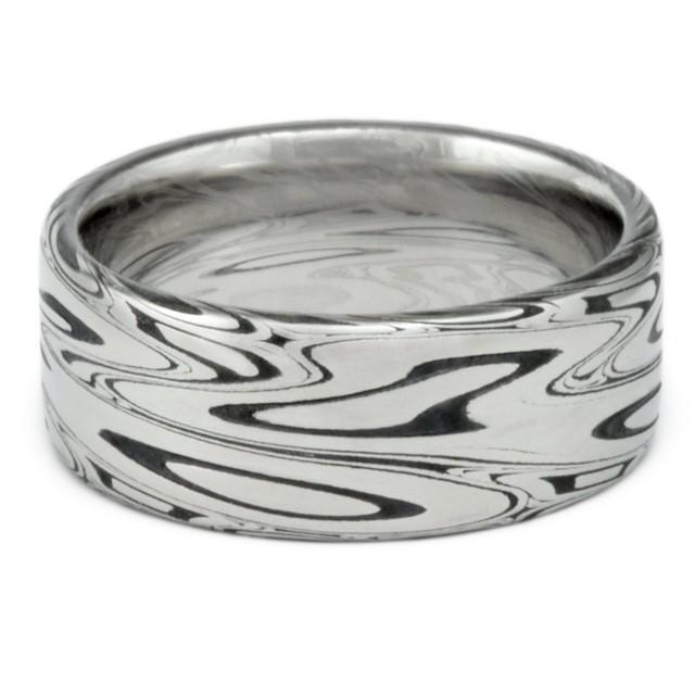 Damascus Mens Wedding Band Flat Wide Band With Powerful Swirling Current And Durable Black Fire Patina Finish Bold Masculine Hand Made 2430471 Weddbook