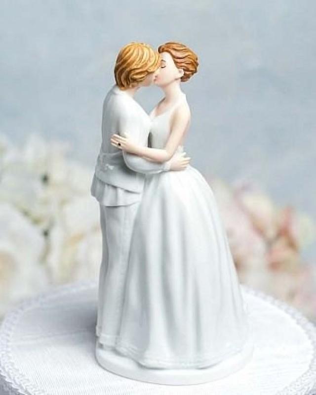 This gay wedding cake topper portrays true emotion as this newly wed couple...