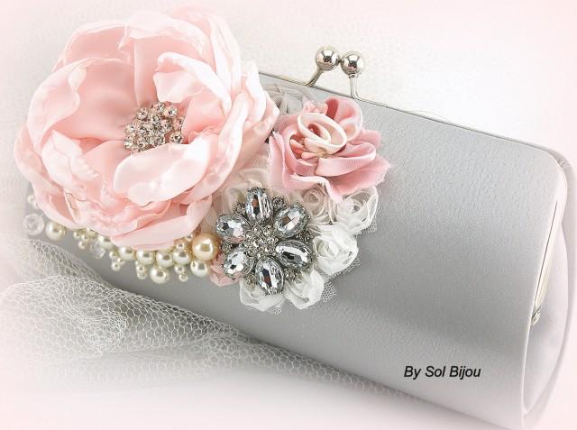 pink and silver clutch bag