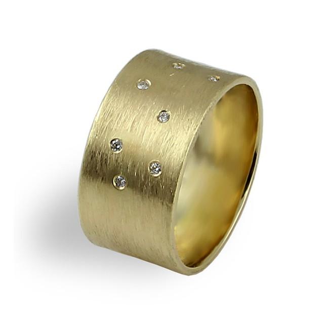 wide yellow gold band with diamonds