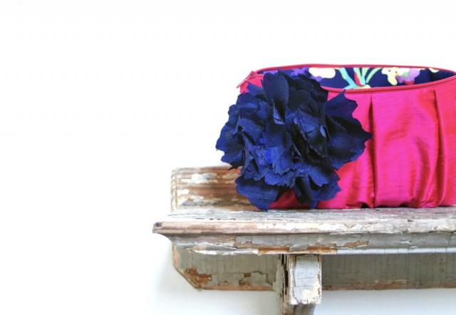 pink and navy clutch bag