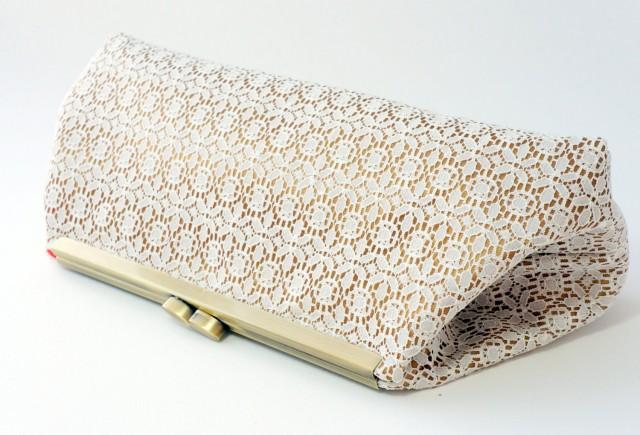 gold lace clutch bag