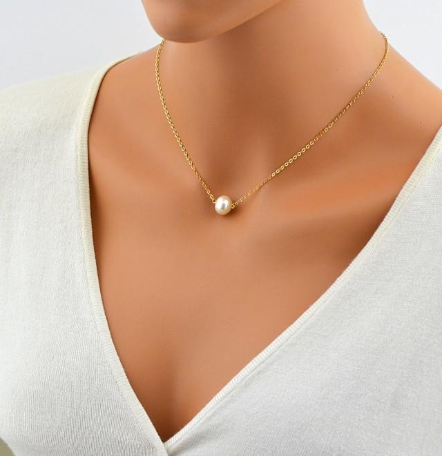 gold necklace with one pearl