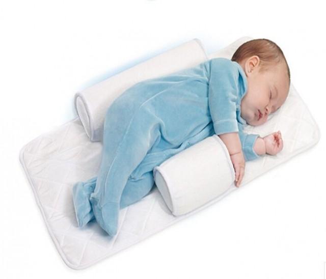 2014Top Quality Newborn Baby Sleep Positioner Infant Anti Roll Pillow