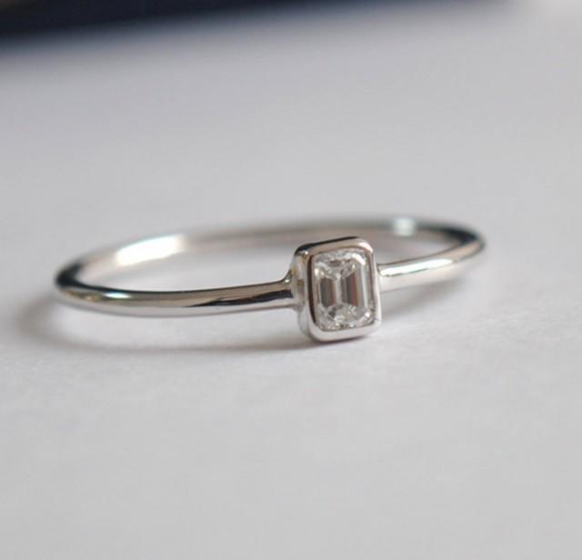 0.08 Ct Emerald Cut Solitaire Diamond Engagement Ring. Bezel Set
