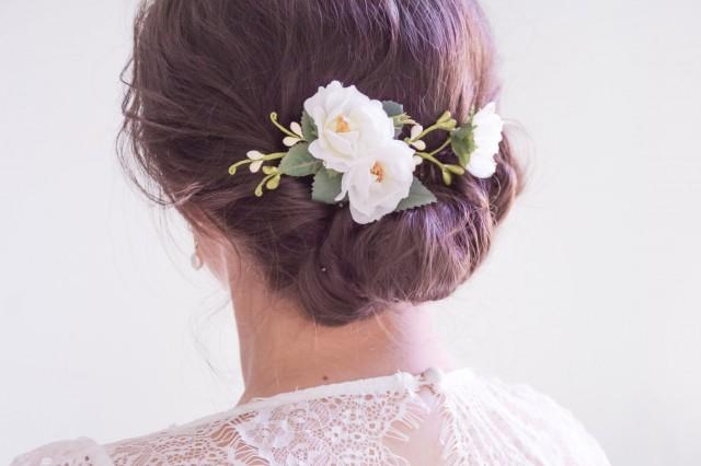 white flower hair piece