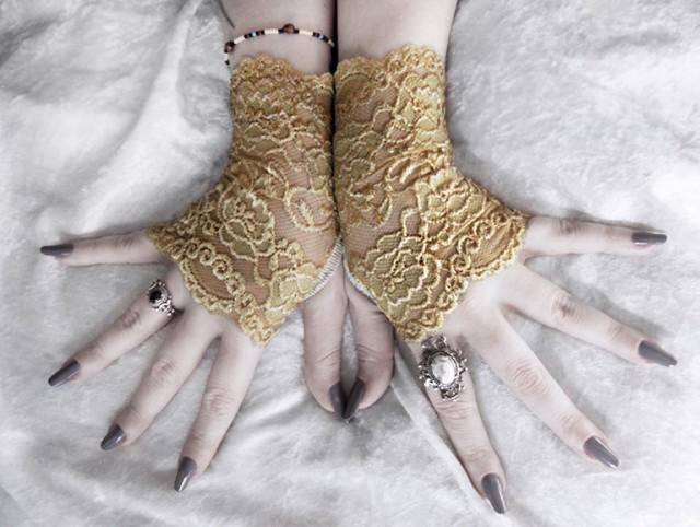 gold fishnet gloves