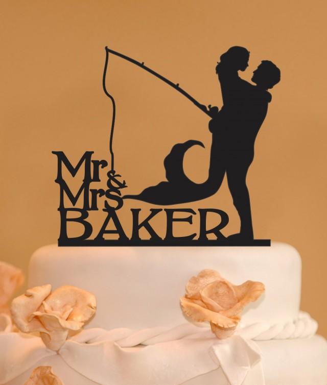 man-holding-mermaid-mr-and-mrs-wedding-cake-topper-last-name-topper