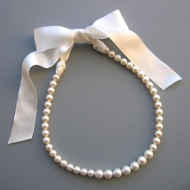 pearl necklace with ribbon tie