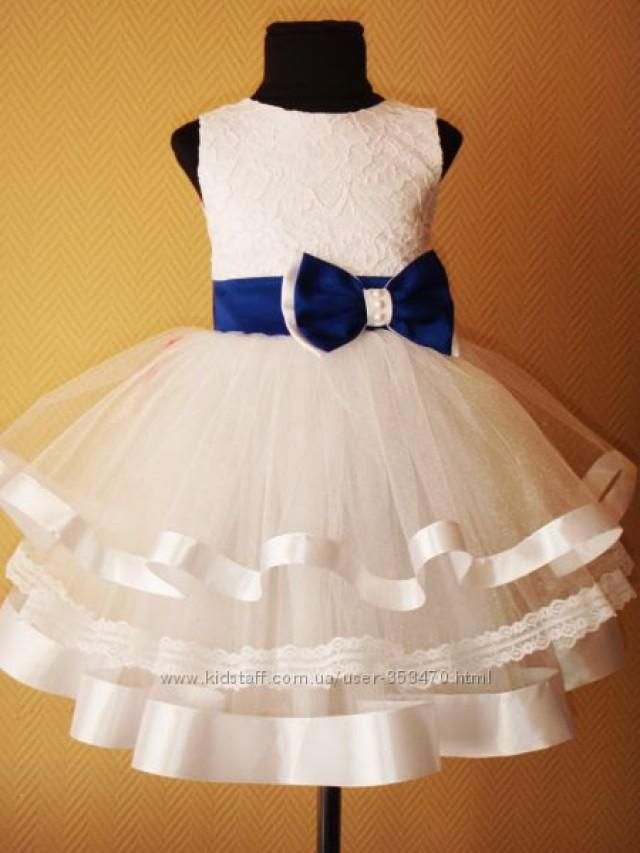 white flower girl dress with blue sash