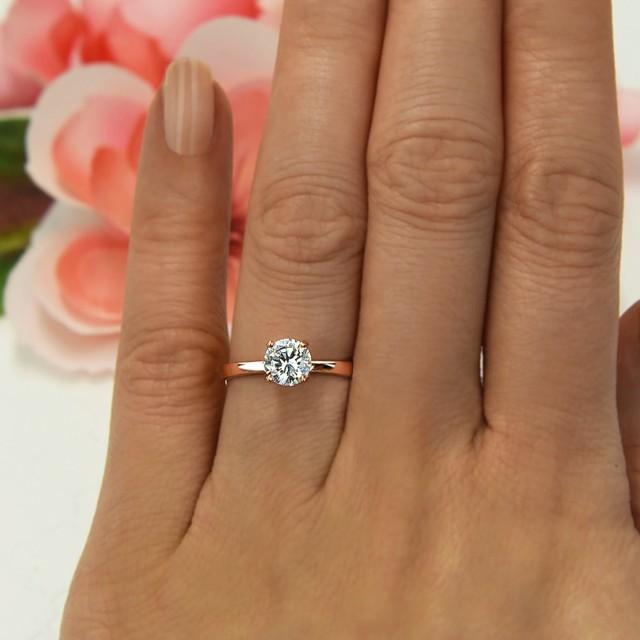 simple thin 14 k gold wedding band with solitaire round diamond engagement ring