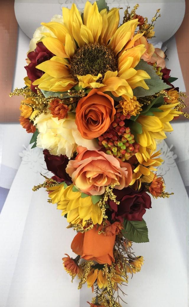 sunflower and red rose wedding bouquets
